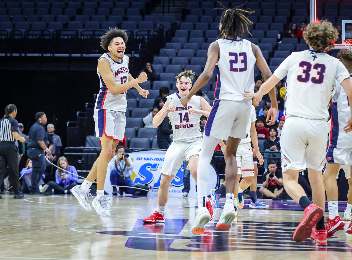 The Crusaders celebrate their Sac-Joaquin Section championship 68-63 win over Lincoln at the Golden 1 Center. 